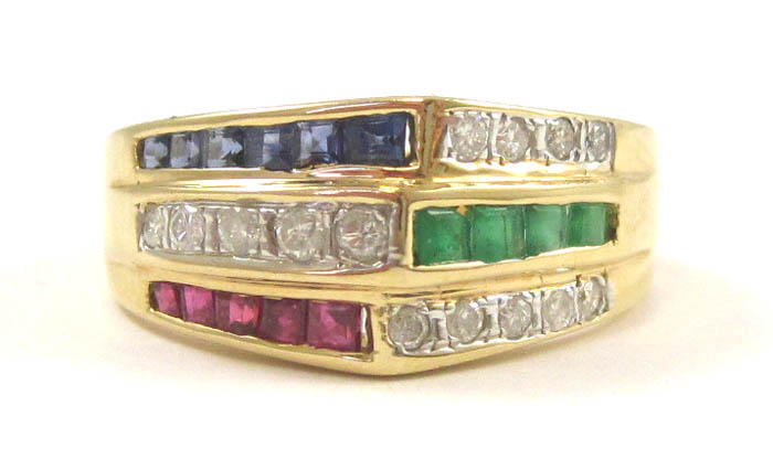 Appraisal: SAPPHIRE RUBY EMERALD AND DIAMOND RING k yellow gold set