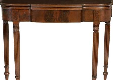 Appraisal: SHERATON FIGURED MAHOGANY CARD TABLE The shaped top with reeded