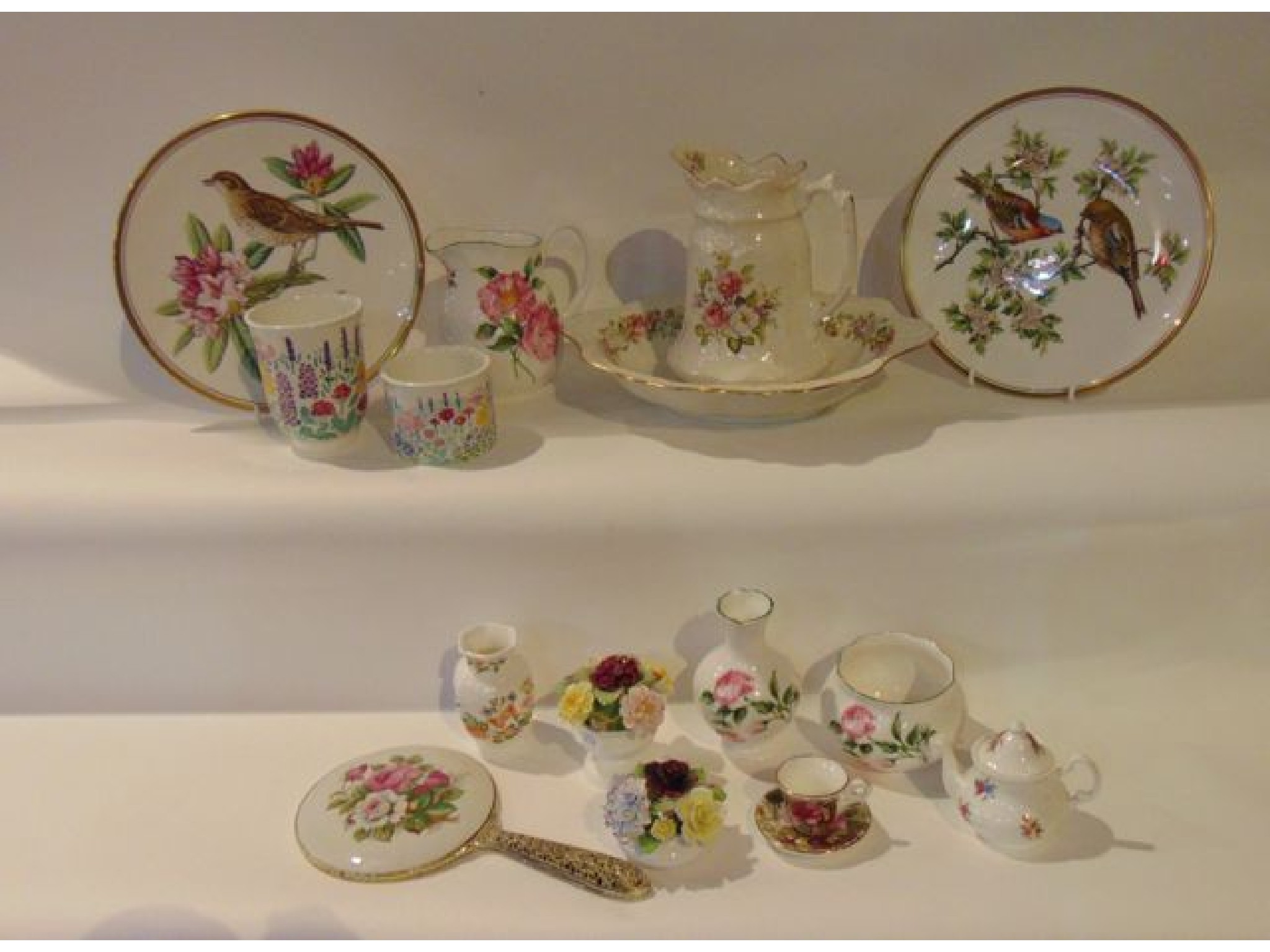 Appraisal: A collection of decorative floral ceramics including a James Kent