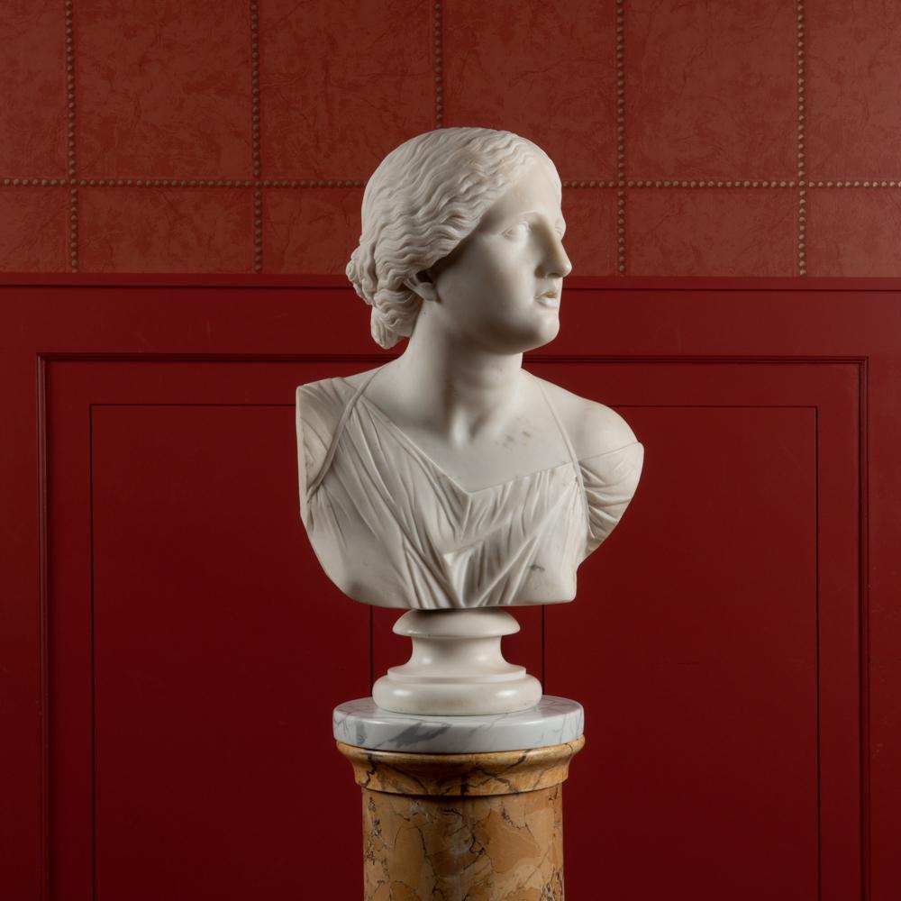 Appraisal: CLASSICAL WHITE MARBLE BUST OF ARTEMIS A finely carved white