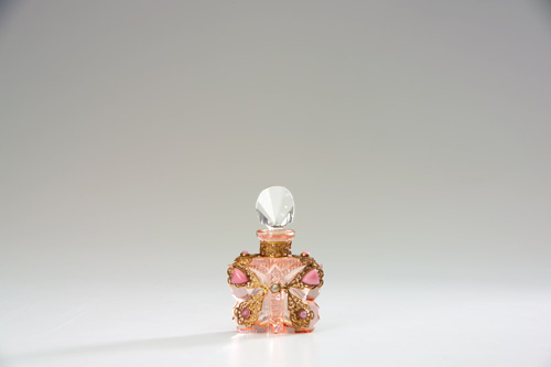 Appraisal: CZECHOSLOVAKIAN Mini perfume bottle shaped as a butterfly in pink