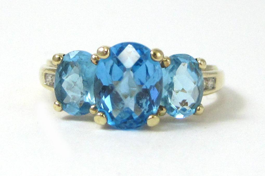 Appraisal: BLUE TOPAZ DIAMOND AND TEN KARAT GOLD RING with two