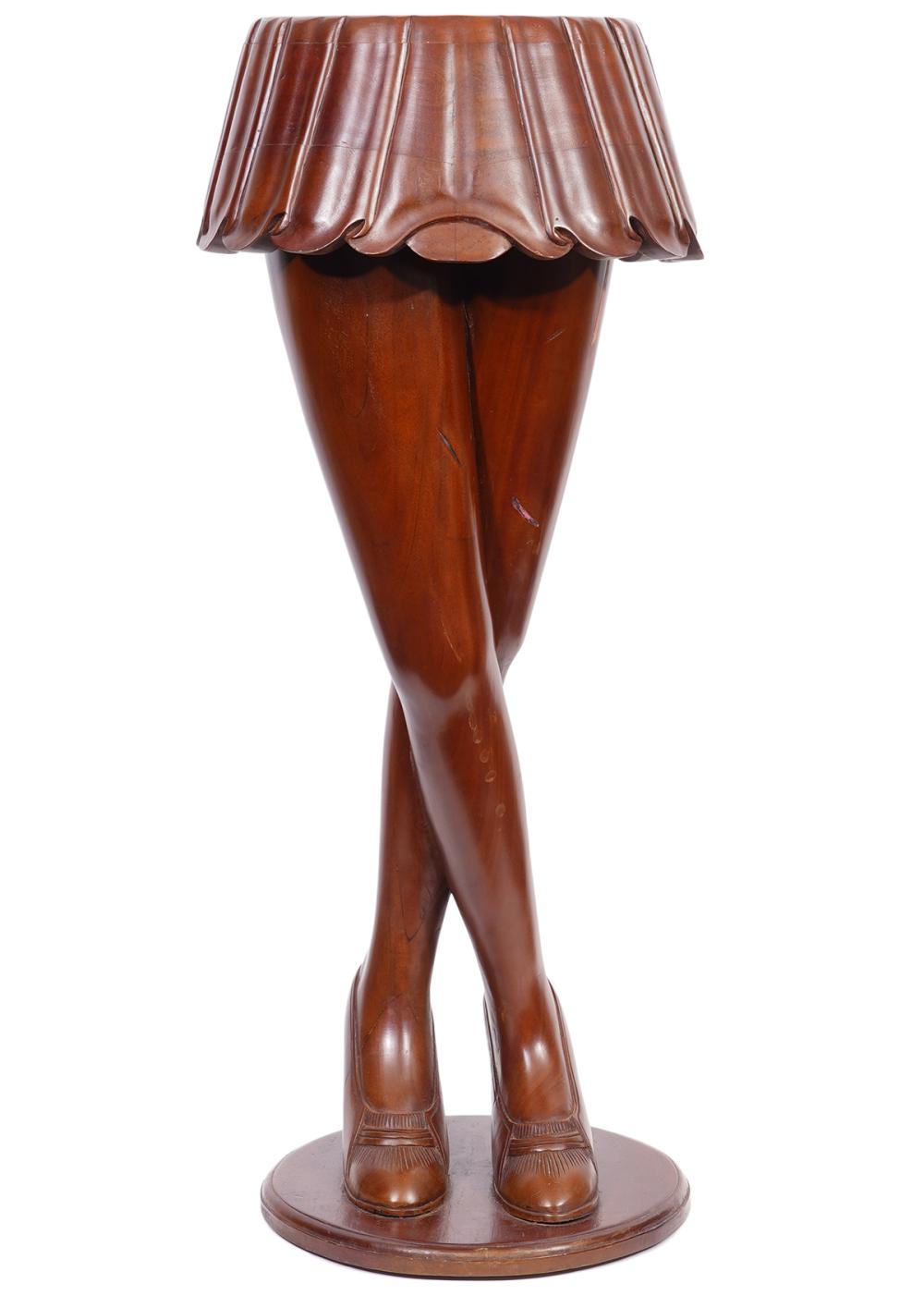 Appraisal: WHIMSICAL 'S 'LEGS' OCCASIONAL TABLEWhimsical occasional table of carved walnut