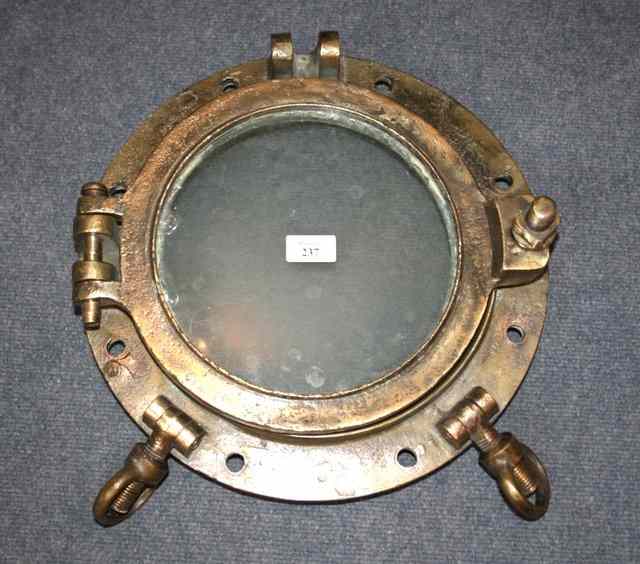 Appraisal: A SHIP'S PHOSPHOR BRONZE AND GLAZED PORT HOLE diameter