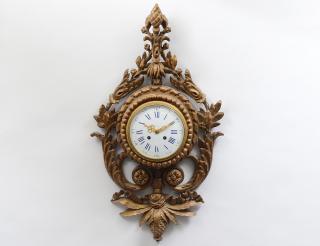 Appraisal: LOUIS XVI STYLE CARVED AND GILTWOOD CARTEL CLOCK European Late