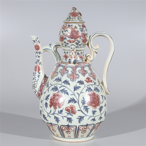 Appraisal: Chinese red blue and white porcelain teapot featuring applied figures