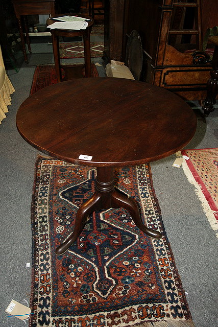 Appraisal: A TH CENTURY MAHOGANY TRIPOD TABLE with turned barrel column