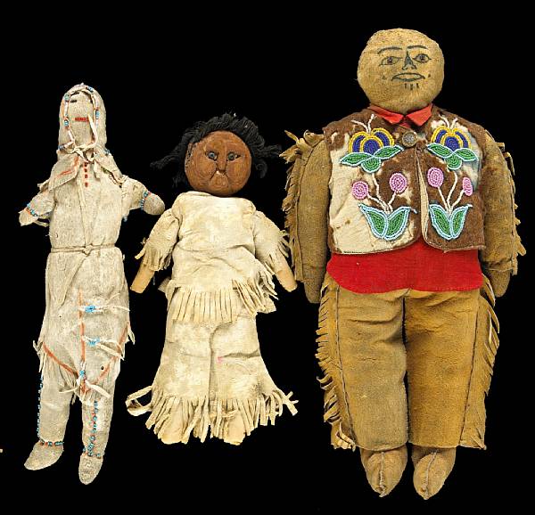 Appraisal: Three Western dolls A Northern California cloth doll with redwood