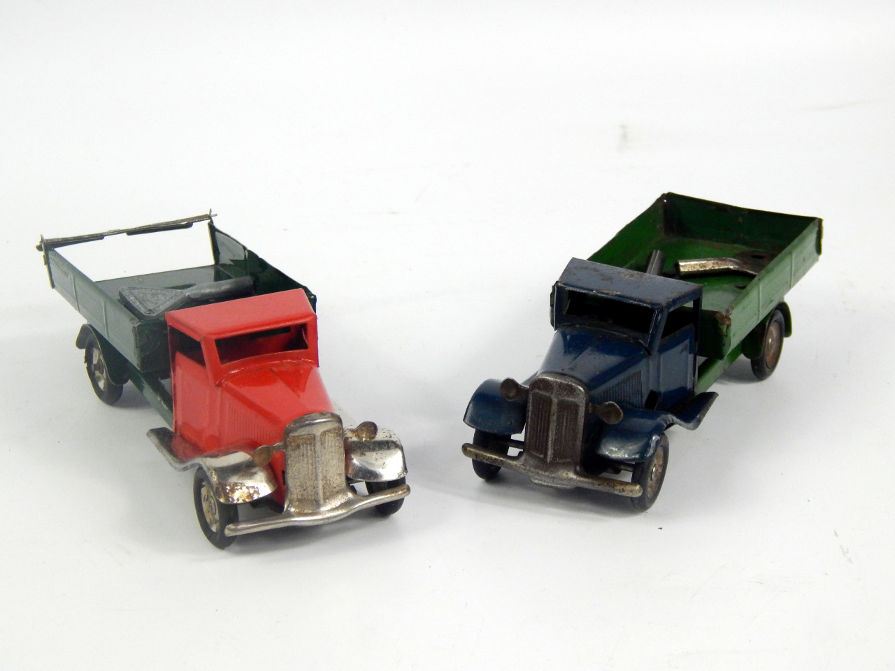 Appraisal: Two Triang Minic toys comprising two tipper goods wagons