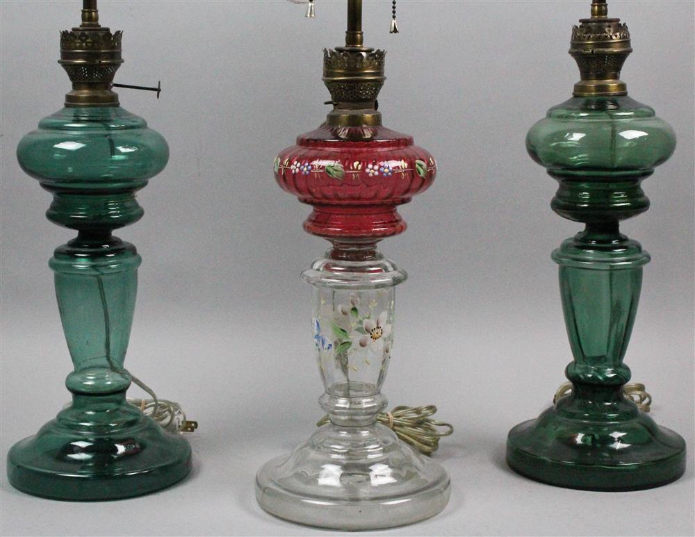 Appraisal: THREE GASOLIERS MOUNTED AS TABLE LAMPS AND WIRED FOR ELECTRICITY