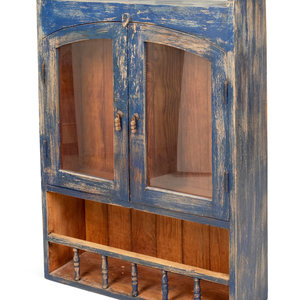 Appraisal: A Rustic Hanging Cabinet in Old Blue Paint American th