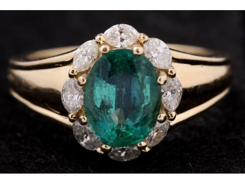 Appraisal: Emerald and Diamond Ring One karat yellow gold emerald and