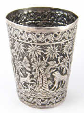 Appraisal: An Indian white metal beaker tests silver heavily embossed with