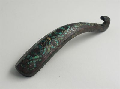 Appraisal: A Chinese bronze belthook inset with turquoise silver and gold