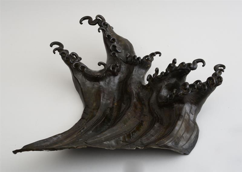 Appraisal: JAPANESE BRONZE MODEL OF THE HOKUSAI WAVE Unsigned incorporating curled