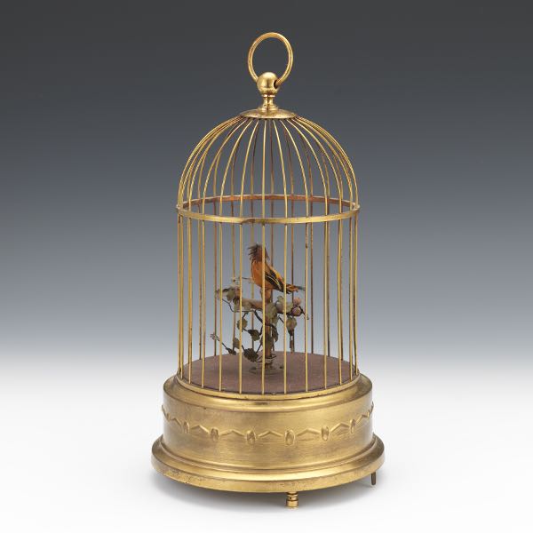 Appraisal: GERMAN SINGING BIRD AUTOMATON IN CAGE x Mechanical singing bird