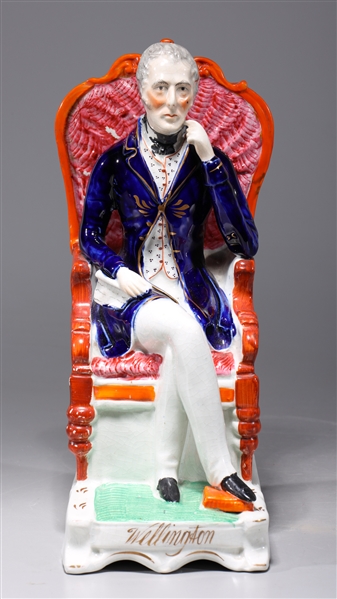 Appraisal: Antique th century Staffordshire porcelain statue of the seated Duke