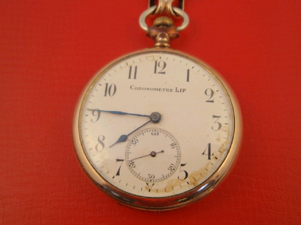 Appraisal: A French open face gold plated pocket watch on a