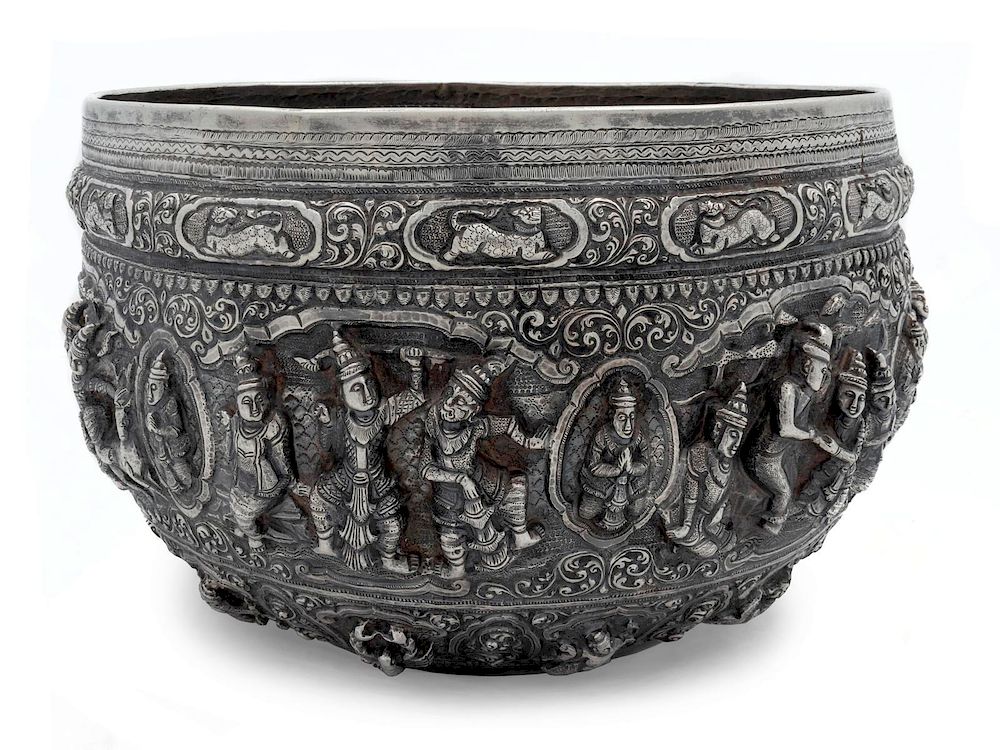 Appraisal: A Burmese Silver Repousse Basin Height x diameter inches A