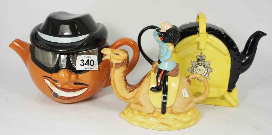 Appraisal: A collection of Cartlon Ware Tea Pots to include Golly