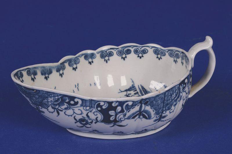 Appraisal: A FIRST PERIOD WORCESTER BLUE AND WHITE SAUCEBOAT circa decorated