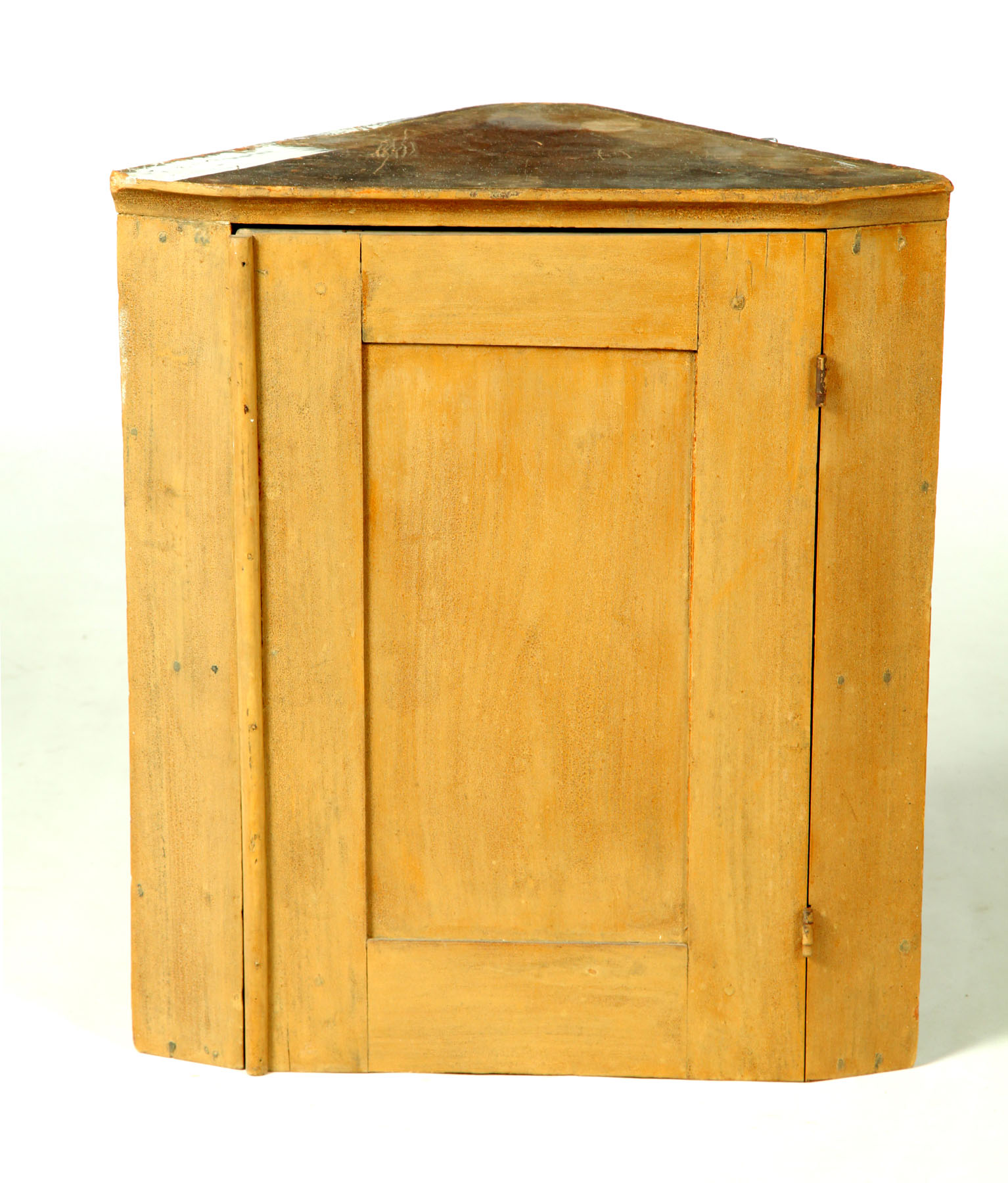 Appraisal: HANGING CORNER CUPBOARD American th century mixed woods Of diminutive