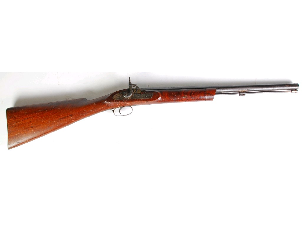 Appraisal: INDIAN NINETEENTH CENTURY AND COMPOSITE PERCUSSION CARBINE the barrel octagonal