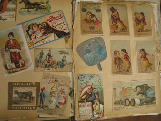 Appraisal: Victorian Scrapbook Album with trade cards cut-outs advertising etc