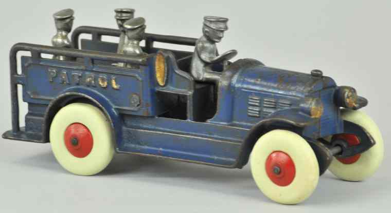 Appraisal: KENTON PATROL WAGON Cast iron painted in blue overall gold