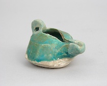 Appraisal: Persian Glazed Oil Lamp ca th - th Century AD