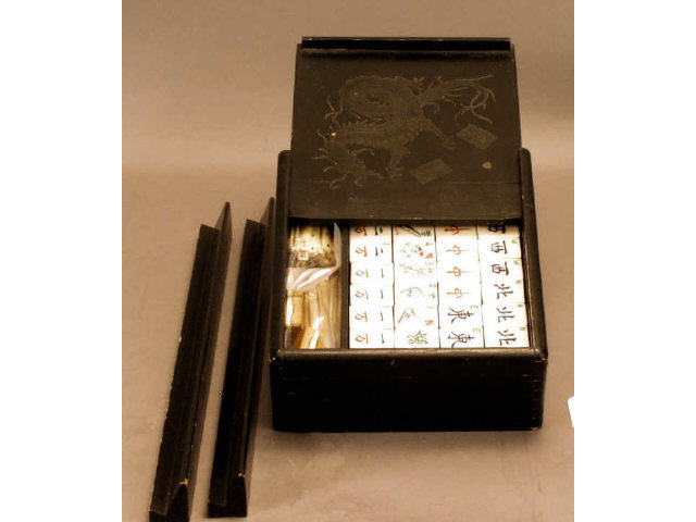 Appraisal: Black cased Chinese Mah Jongg set with ivory tiles Complete