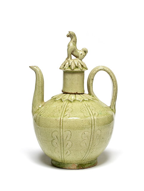 Appraisal: A South East Asian pale celadon ewer and cover th