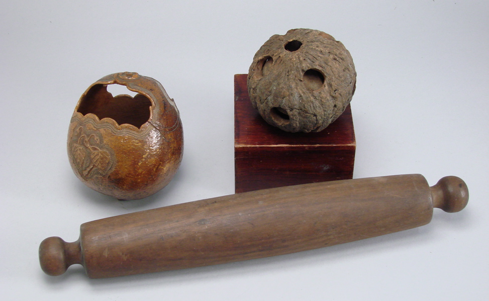 Appraisal: THREE UNUSUAL CARVED WOODEN ITEMS th Century Rolling pin length