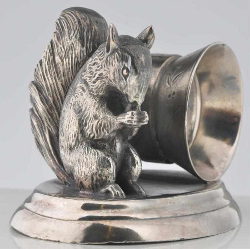 Appraisal: Large Squirrel with Nut Figural Napkin Ring Holder on oval