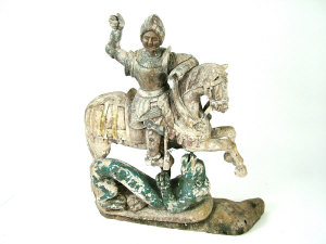 Appraisal: A Continental carved wooden equestrian figure of St George slaying