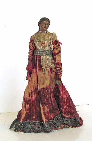 Appraisal: An Italian terracotta wood and cloth cr che figure early