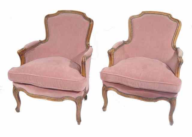 Appraisal: A PAIR OF CONTINENTAL PINK UPHOLSTERED BEECH FRAMED ARMCHAIRS approximately