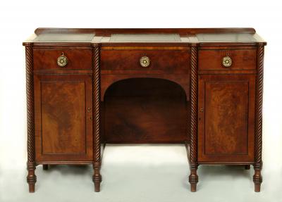 Appraisal: A MAHOGANY DESK DRESSING CHEST early th century and later