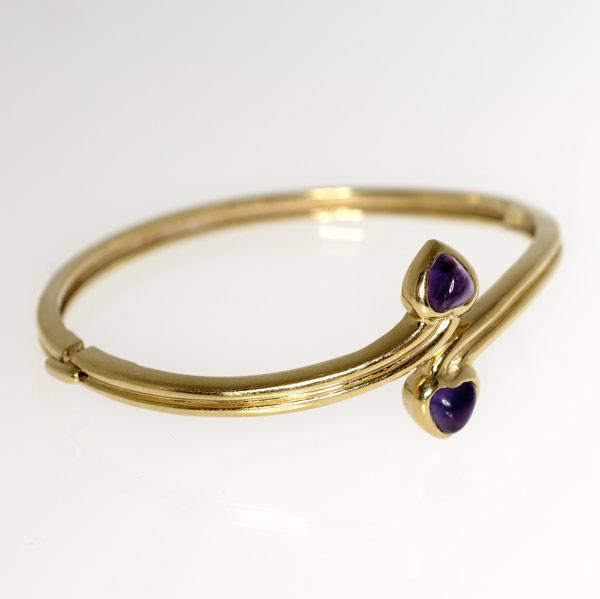 Appraisal: FARAONE Gold and amethyst hinged bypass bracelet k yg with