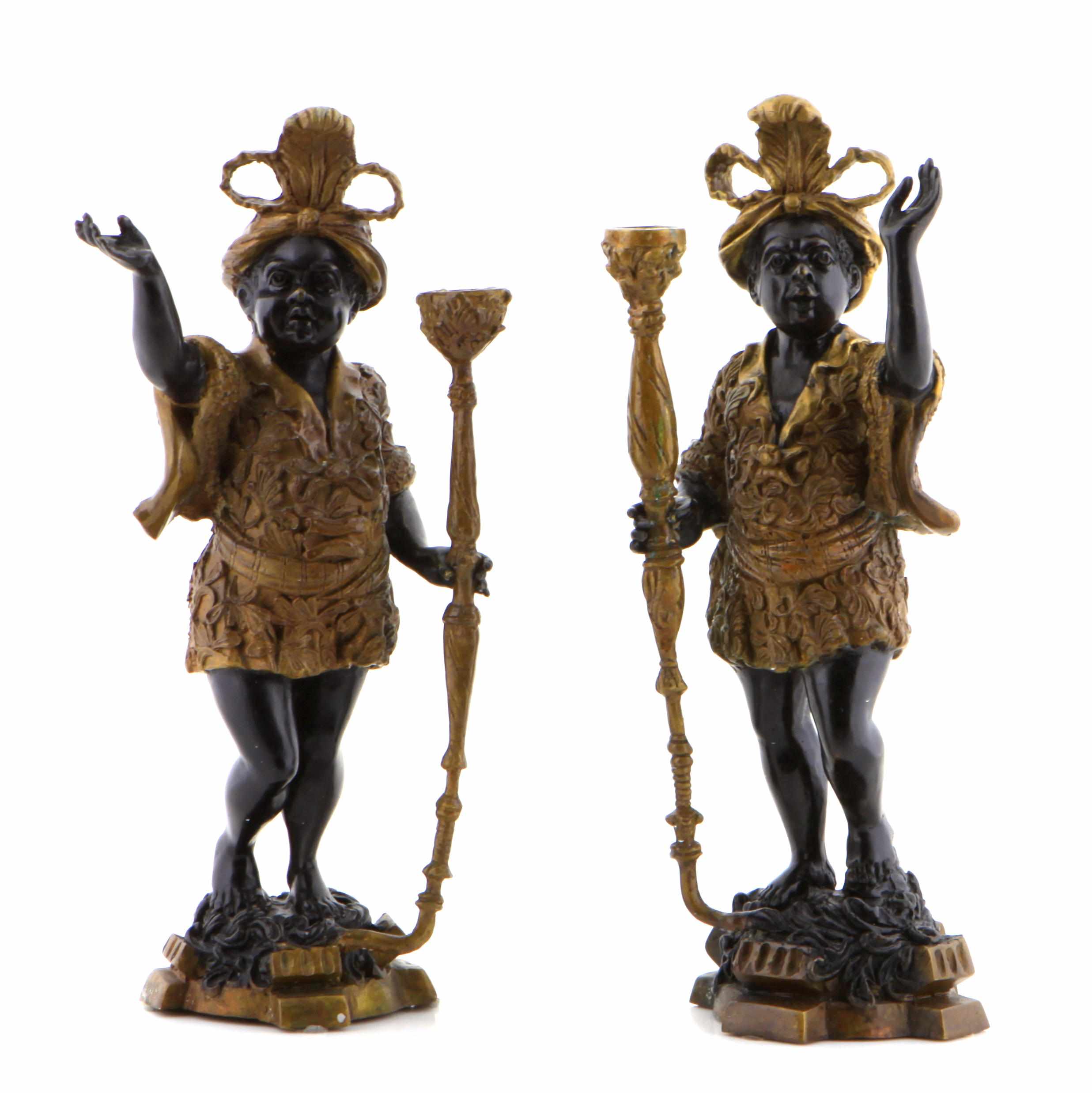 Appraisal: A pair of bronze figural candlesticks height in