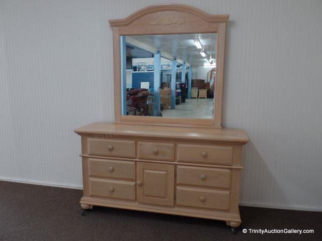 Appraisal: Natural Pickled Oak Triple Dresser w Mirror Traditional style triple