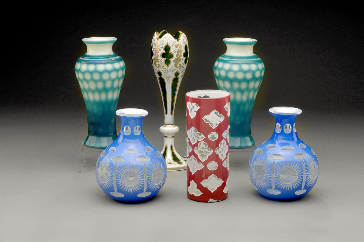 Appraisal: FOUR AMERICAN CUT-OVERLAY GLASS VASES LATE NINETEENTH-TWENTIETH CENTURY Comprising a