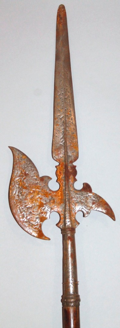 Appraisal: A ceremonial pike with oak cylindrical handle and metal end