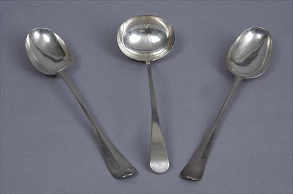 Appraisal: TWO GEORGE II MONOGRAMMED SILVER STUFFING SPOONS AND A GEORGE