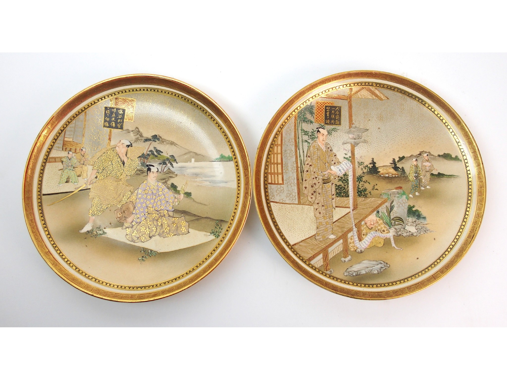 Appraisal: A pair of Satsuma dishespainted with Samurai in gardens within