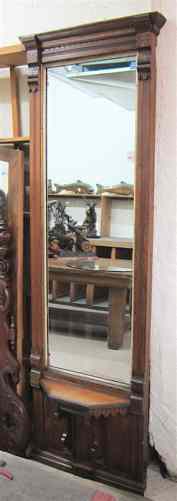 Appraisal: A VICTORIAN WALNUT-FRAMED PIER MIRROR Eastlake design American c Dimensions