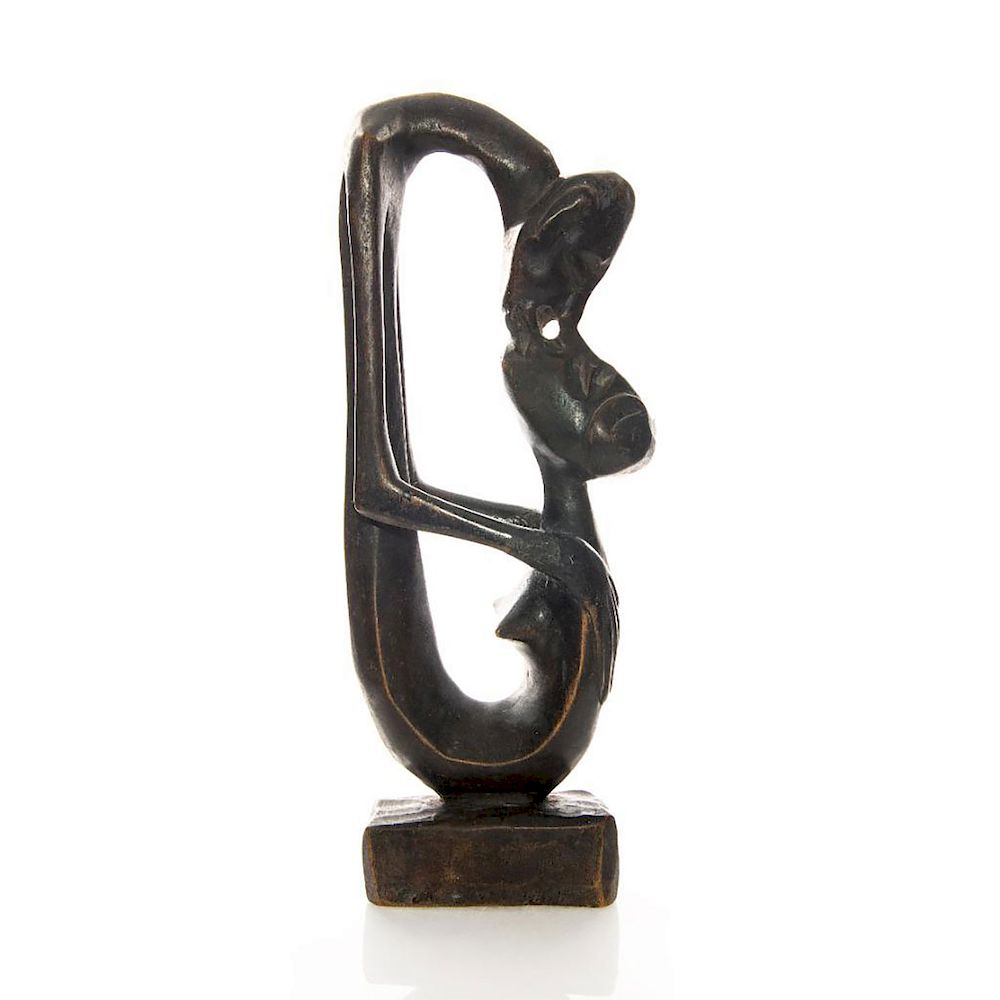 Appraisal: AFRICAN CARVED WOOD SCULPTURE MAN AND WOMAN KISSING Oblong statue