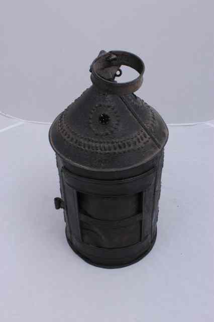 Appraisal: AN ANTIQUE CYLINDRICAL IRON LANTERN with pierced geometric decoration and