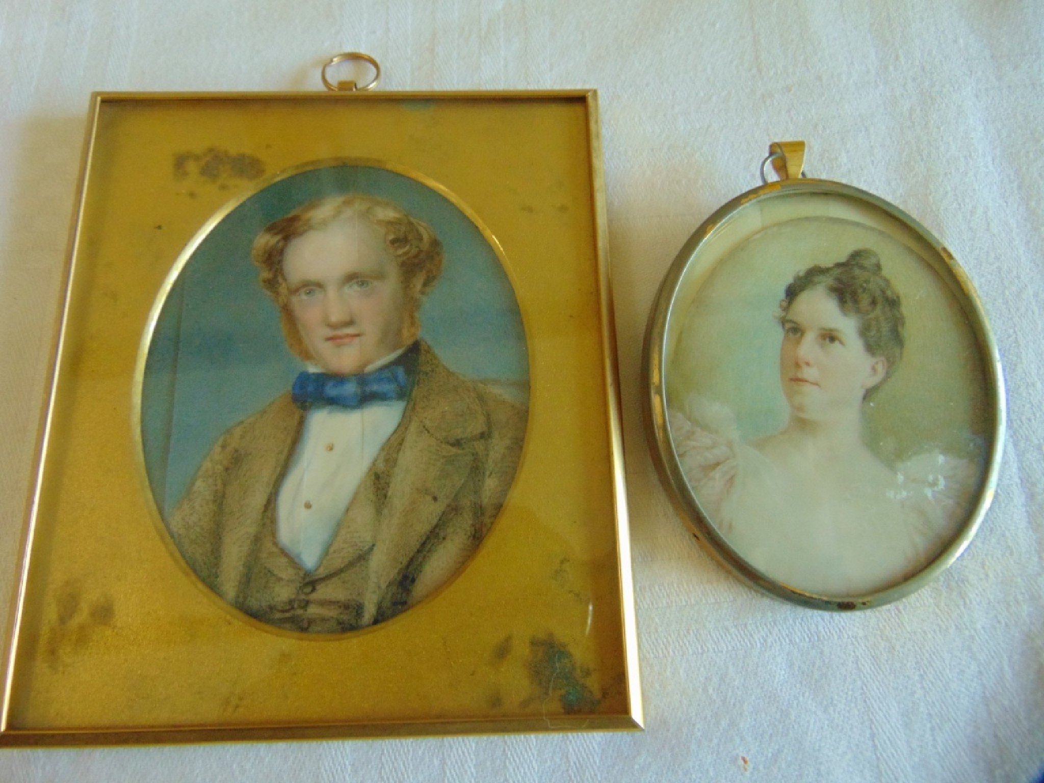 Appraisal: An oval watercolour miniature portrait showing a bust length study