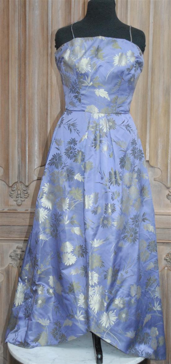 Appraisal: EVENING SILK DRESS Muted gray floral on violet backround Sizes